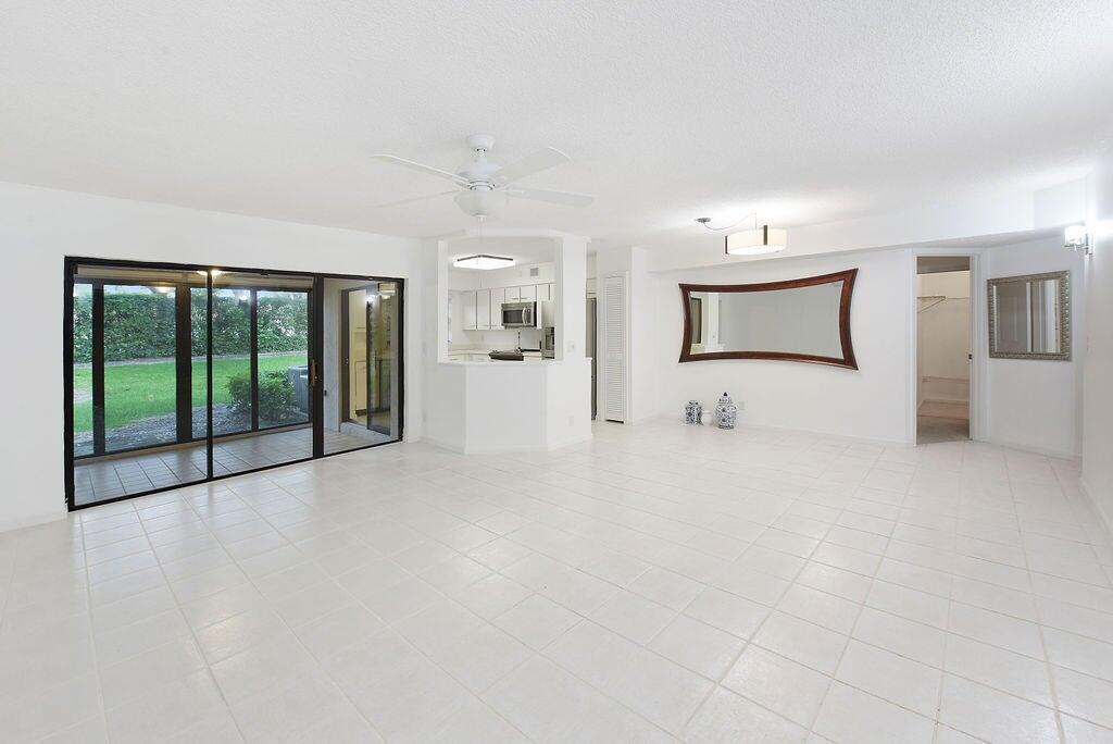 17340 Boca Club Boulevard, Unit 704 Boca Raton, FL 33487 - Photo 8 of 27 a view of an empty room with a window