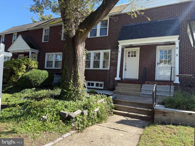 a front view of a house with a garage
