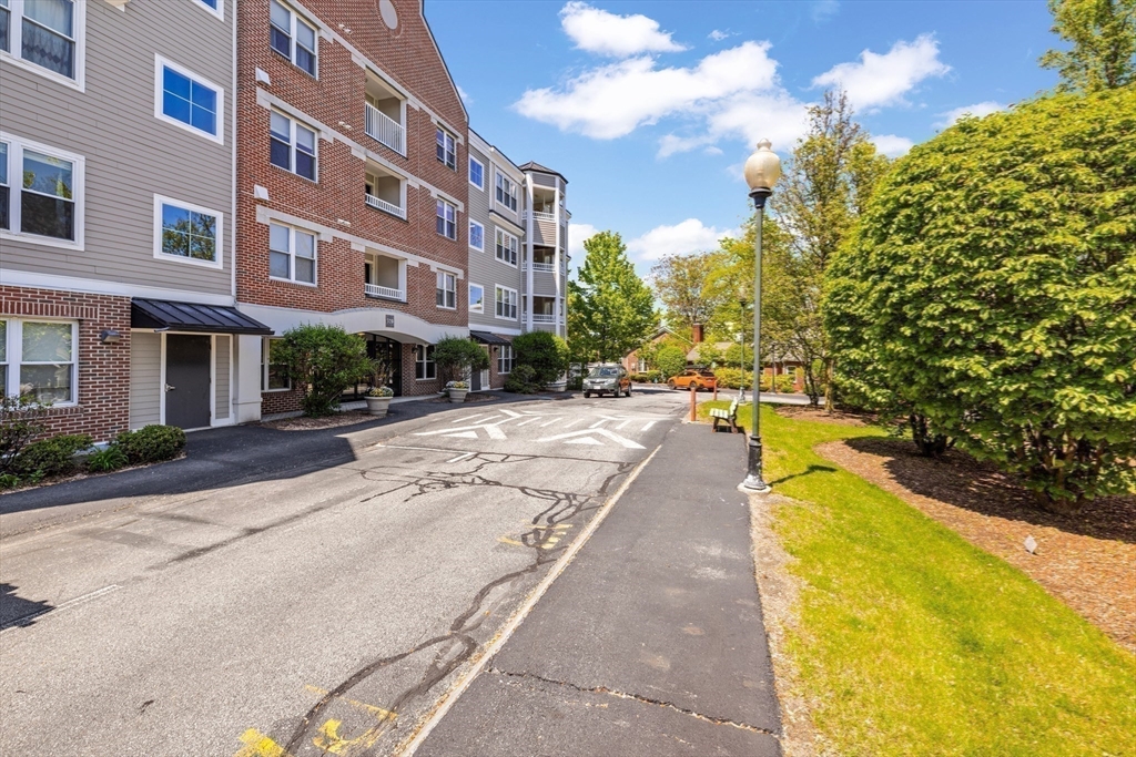320 Rindge Avenue, Unit 303 Cambridge, MA 02140 - Photo 19 of 28 a view of a building with swimming pool