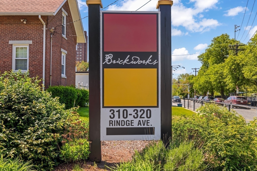 320 Rindge Avenue, Unit 303 Cambridge, MA 02140 - Photo 20 of 28 a sign on the side of the building