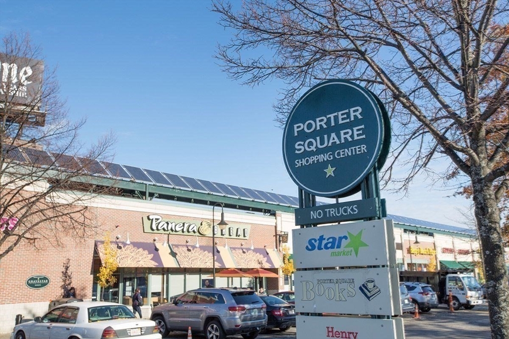 320 Rindge Avenue, Unit 303 Cambridge, MA 02140 - Photo 28 of 28 a front view of a building with garden