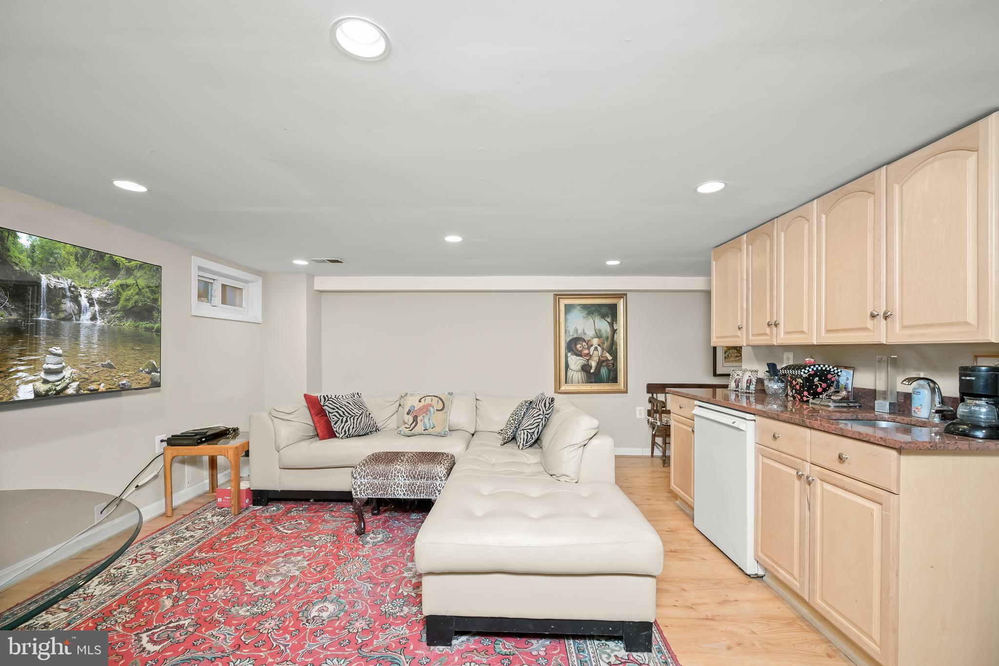 1906 37th Street Northwest Washington, DC 20007 - Photo 21 of 22 a living room with furniture and a couch