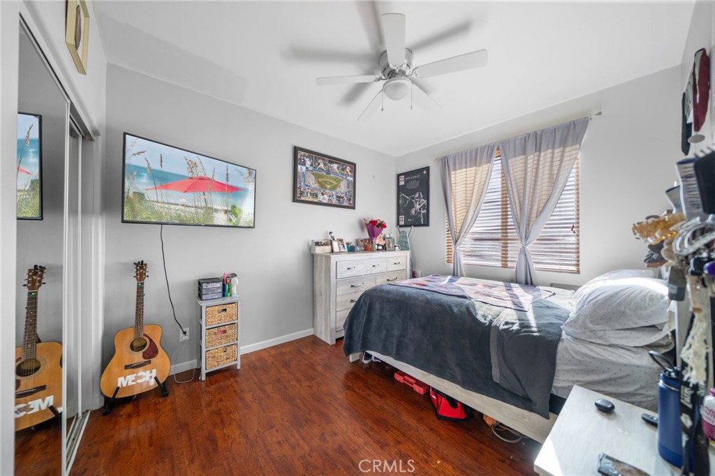 29611 Camino Cristal Menifee, CA 92584 - Photo 11 of 33 a bedroom with furniture and a window