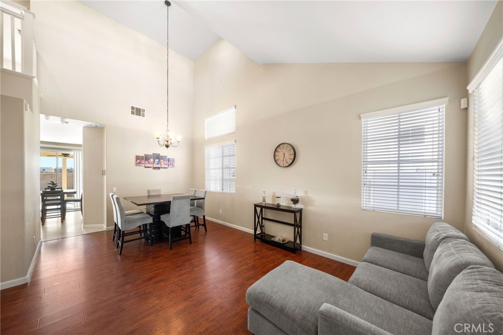 29611 Camino Cristal Menifee, CA 92584 - Photo 2 of 33 a living room with furniture window and wooden floor