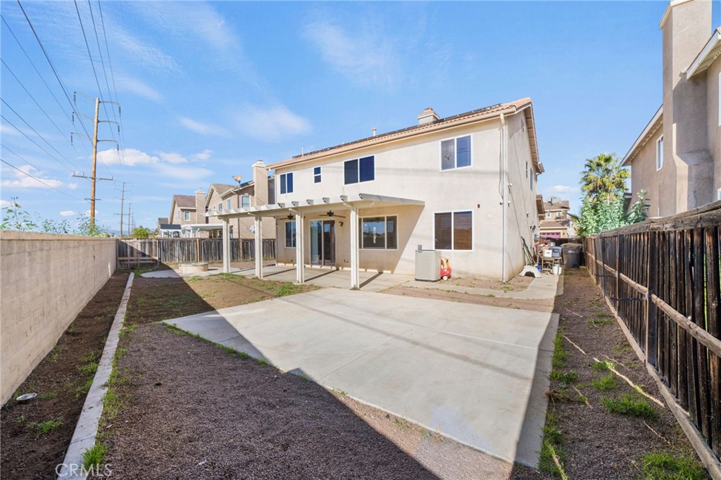 29611 Camino Cristal Menifee, CA 92584 - Photo 29 of 33 a view of a house with backyard and sitting area