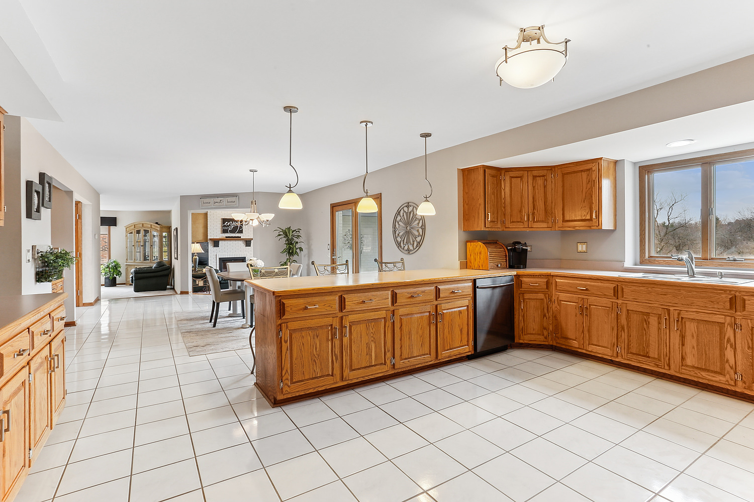13629 South Kickapoo Trail Homer Glen, IL 60491 - Photo 20 of 28 a large kitchen with a lot of counter space and a sink