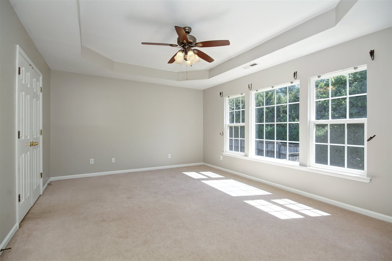 7444 Lagrange Drive Raleigh, NC 27613 - Photo 16 of 30 Carpet and a very large walk in closet in the en suite. Master Bedroom