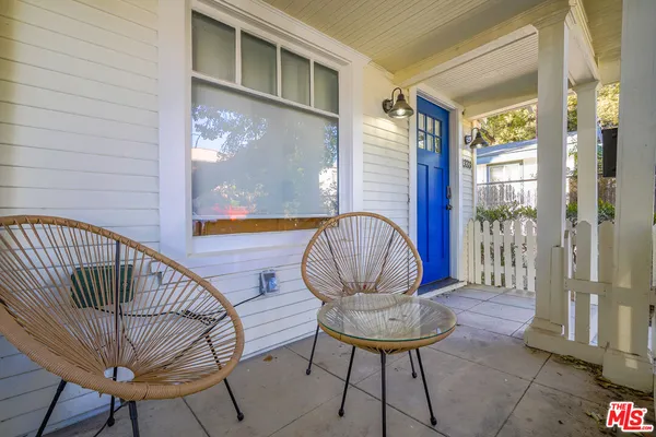 a view of entryway with wooden floor and door