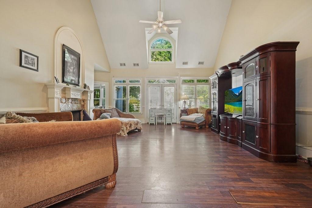 1513 Old Jones Road Alpharetta, GA 30004 - Photo 14 of 62 a living room with furniture and a flat screen tv