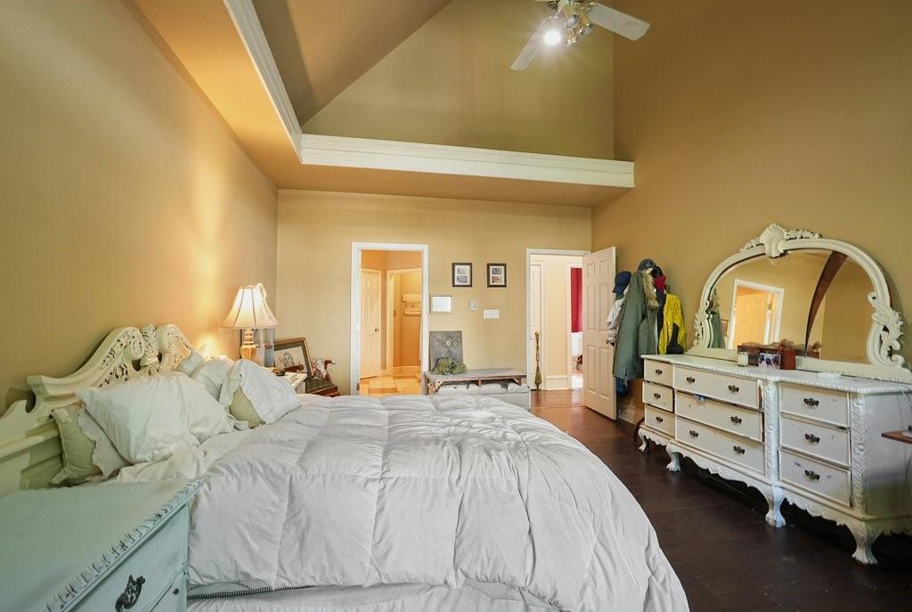 1513 Old Jones Road Alpharetta, GA 30004 - Photo 41 of 62 a bedroom with a bed and a dresser