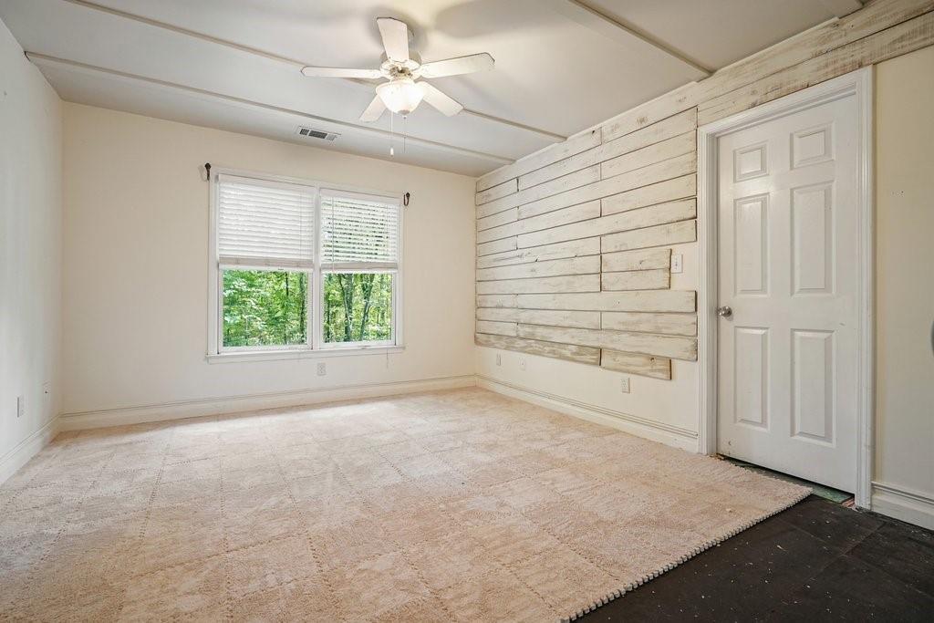 1513 Old Jones Road Alpharetta, GA 30004 - Photo 48 of 62 an empty room with windows