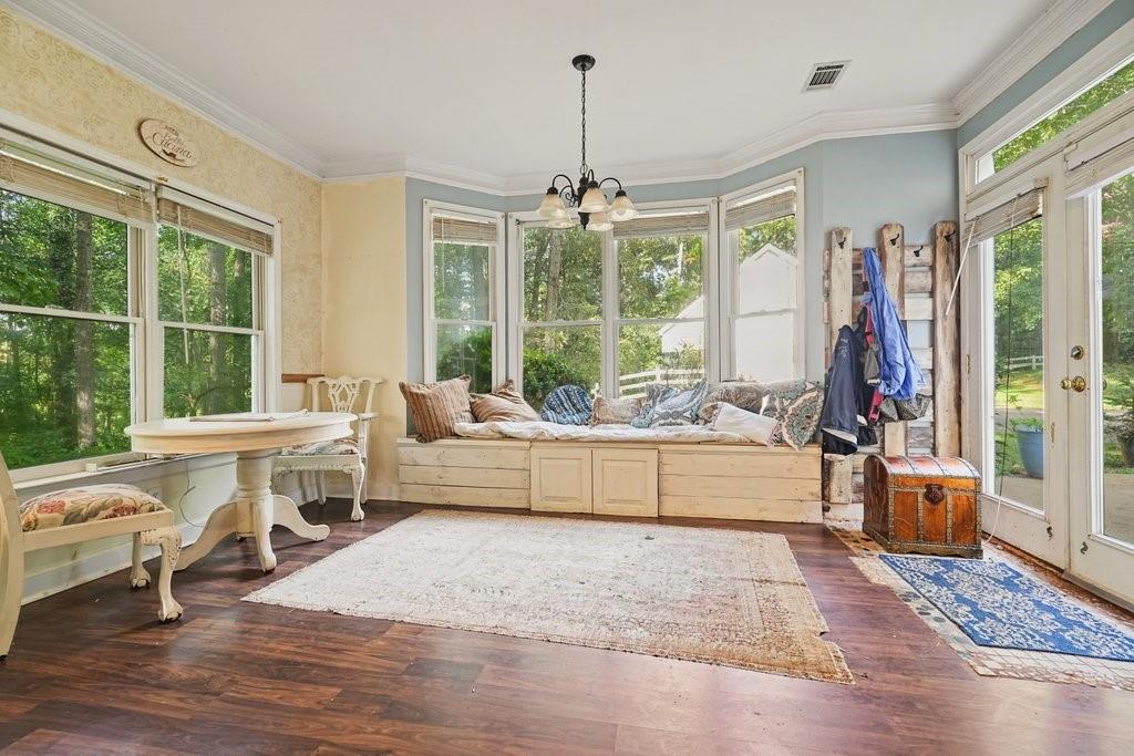 1513 Old Jones Road Alpharetta, GA 30004 - Photo 5 of 62 a living room with furniture and a large window