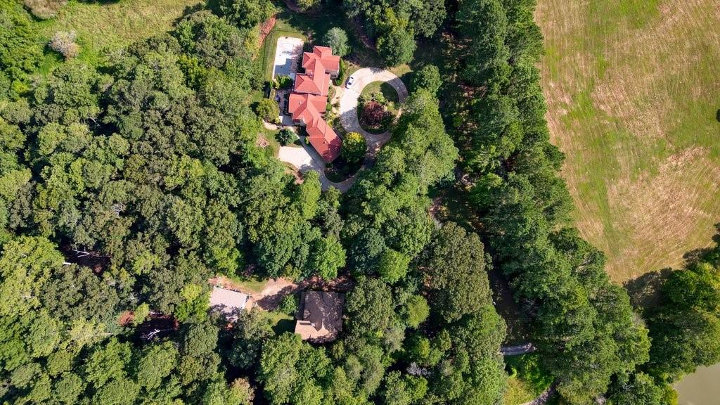 1513 Old Jones Road Alpharetta, GA 30004 - Photo 57 of 62 a view of a house with a tree