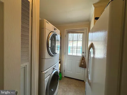 a close view of a utility room with washer and dryer