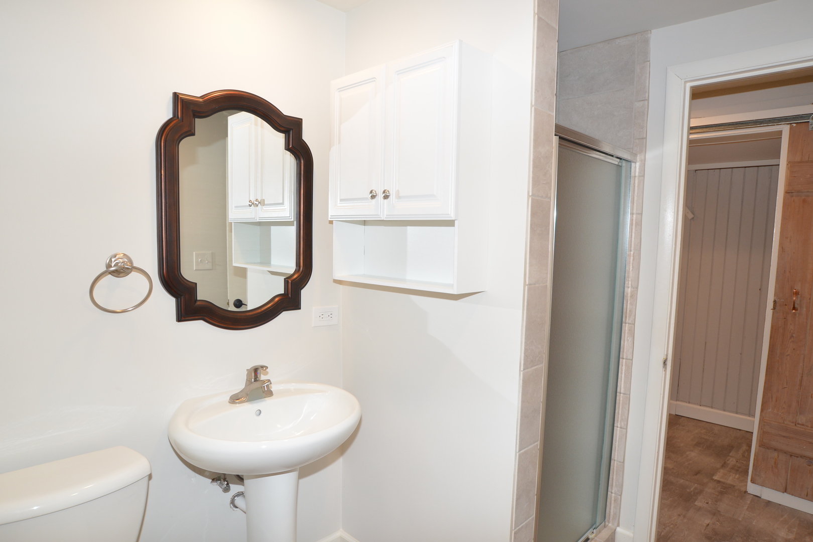 346 Park Place Glencoe, IL 60022 - Photo 10 of 15 a bathroom with a sink and a mirror