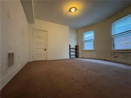 an empty room with windows