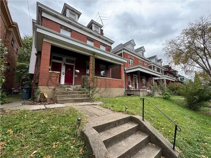 front view of house with a yard