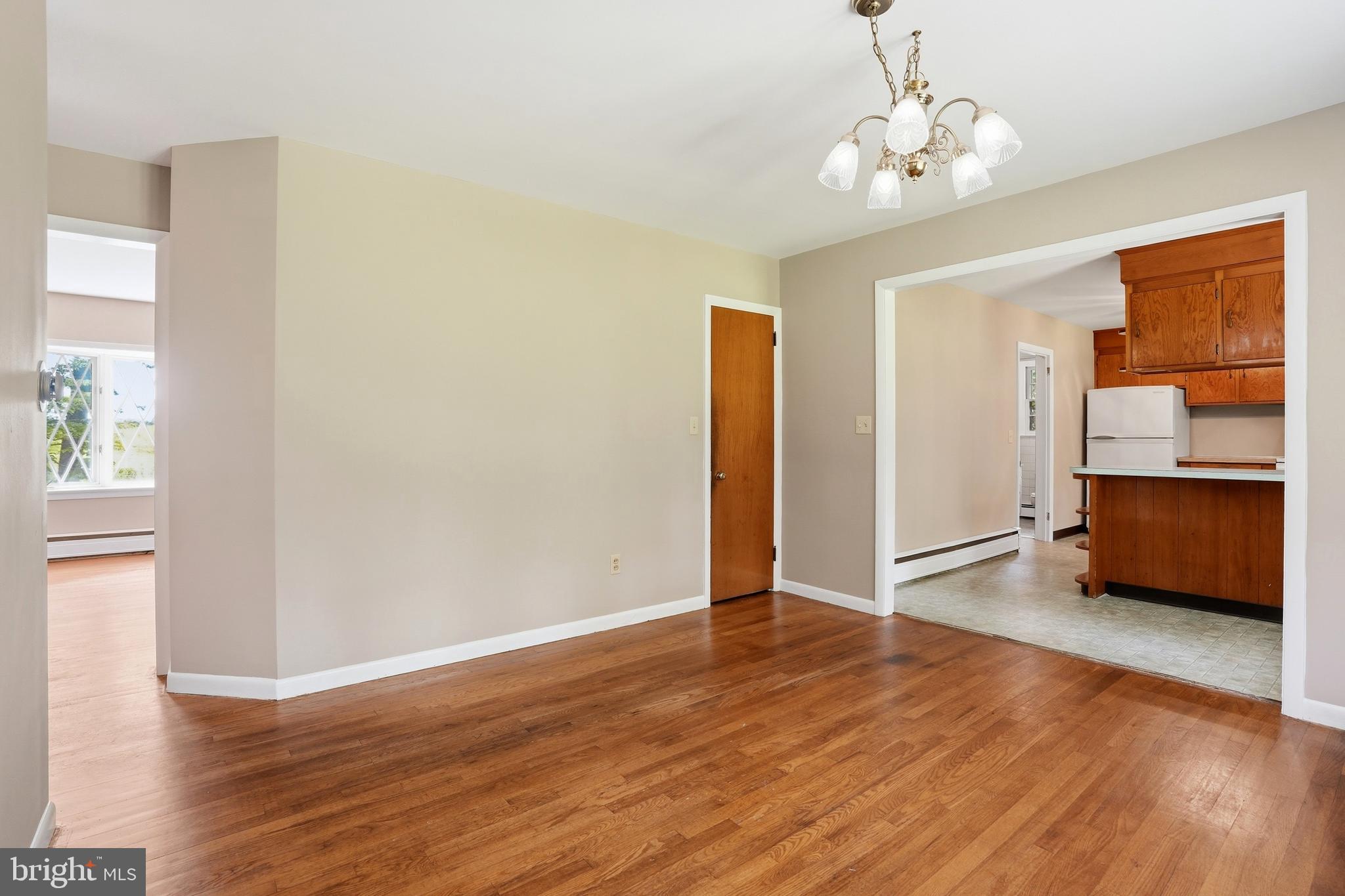 486 Derstine Road Hatfield, PA 19440 - Photo 11 of 53 an empty room with wooden floor and windows
