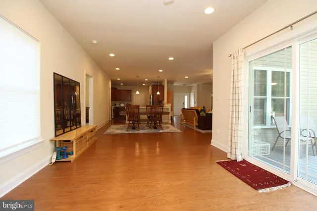 a view of a lobby with black carpet