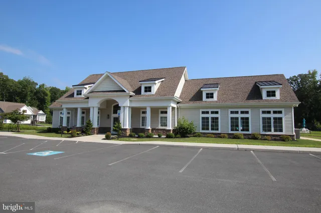 a front view of a building with street view