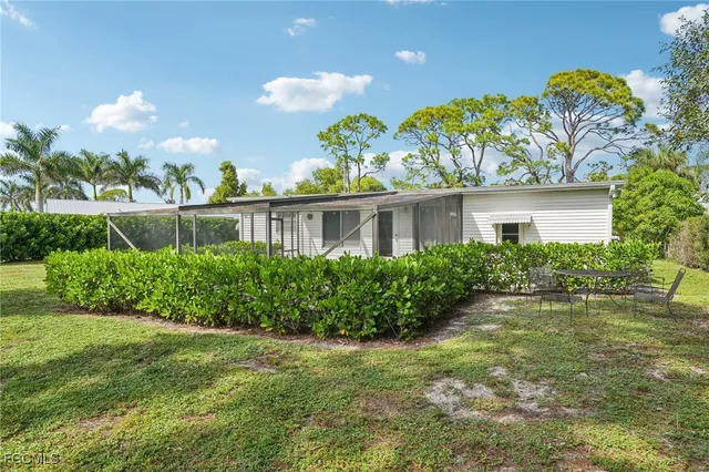 a view of a garden with a fountain