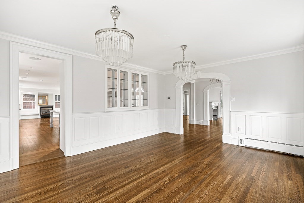 106 Clinton Road Brookline, MA 02445 - Photo 20 of 42 a view of empty room with wooden floor