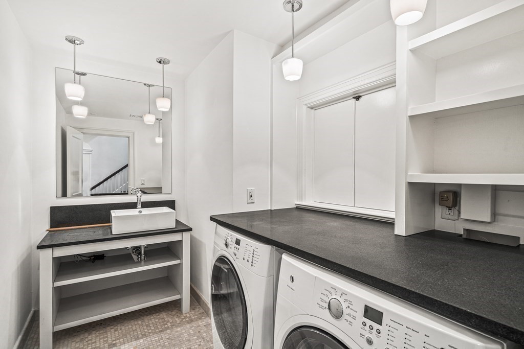 106 Clinton Road Brookline, MA 02445 - Photo 24 of 42 a view of kitchen and utility room