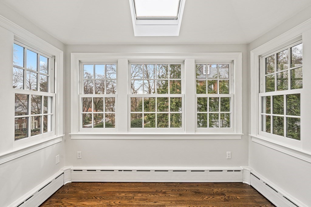 106 Clinton Road Brookline, MA 02445 - Photo 26 of 42 a view of an empty room with a window