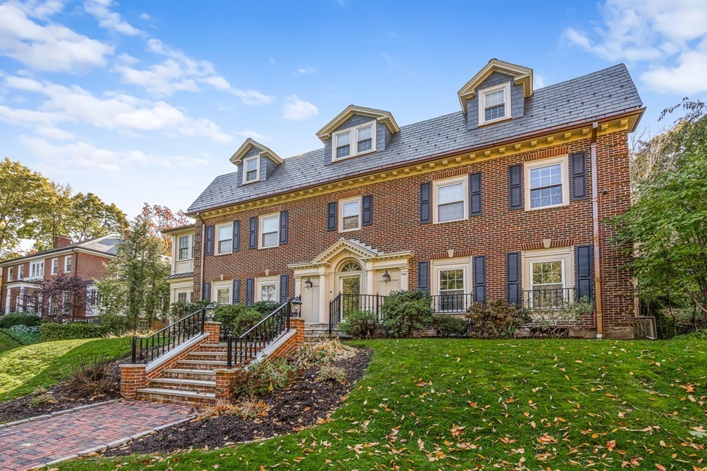 106 Clinton Road Brookline, MA 02445 - Photo 3 of 42 a front view of a house with a yard