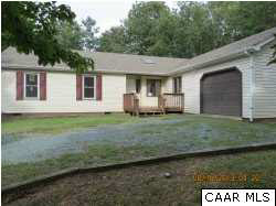 3 Deer Path Road Palmyra, VA 22963 - Photo 1 of 13 a front view of a house with garden