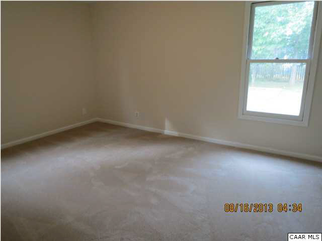 3 Deer Path Road Palmyra, VA 22963 - Photo 11 of 13 an empty room with a window
