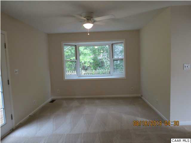 3 Deer Path Road Palmyra, VA 22963 - Photo 3 of 13 an empty room with a window