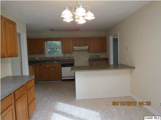 3 Deer Path Road Palmyra, VA 22963 - Photo 4 of 13 a kitchen with cabinets and window