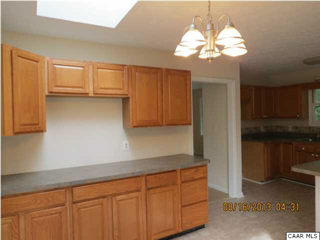 3 Deer Path Road Palmyra, VA 22963 - Photo 5 of 13 a kitchen with a sink and cabinets