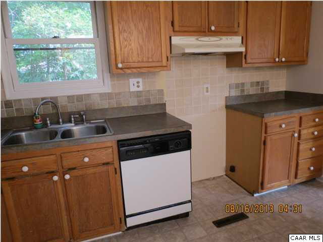 3 Deer Path Road Palmyra, VA 22963 - Photo 6 of 13 a kitchen with stainless steel appliances granite countertop a sink stove and cabinets