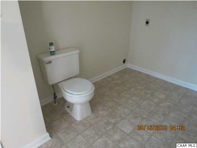 3 Deer Path Road Palmyra, VA 22963 - Photo 8 of 13 a white toilet sitting next to a white sink
