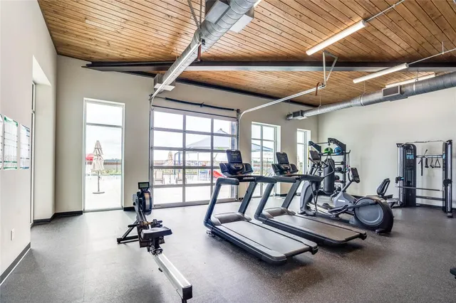 a living room with lots of furniture and couch