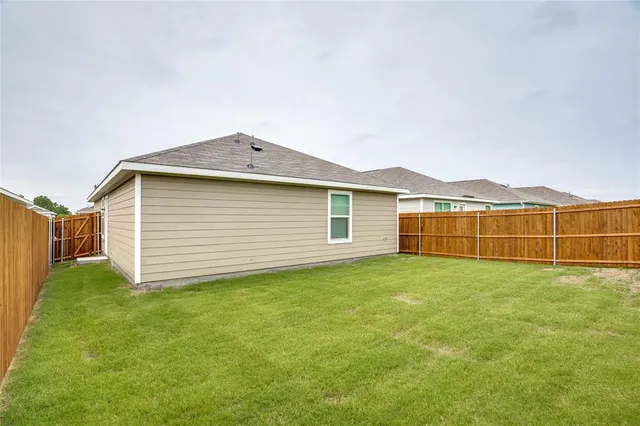 a view of a backyard of house