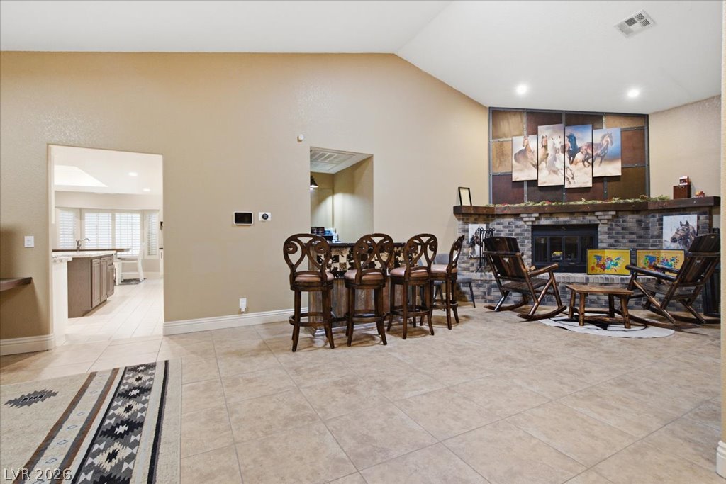 6191 South Lindell Road Las Vegas, NV 89118 - Photo 11 of 53 Wet bar and wood-burning fireplace.