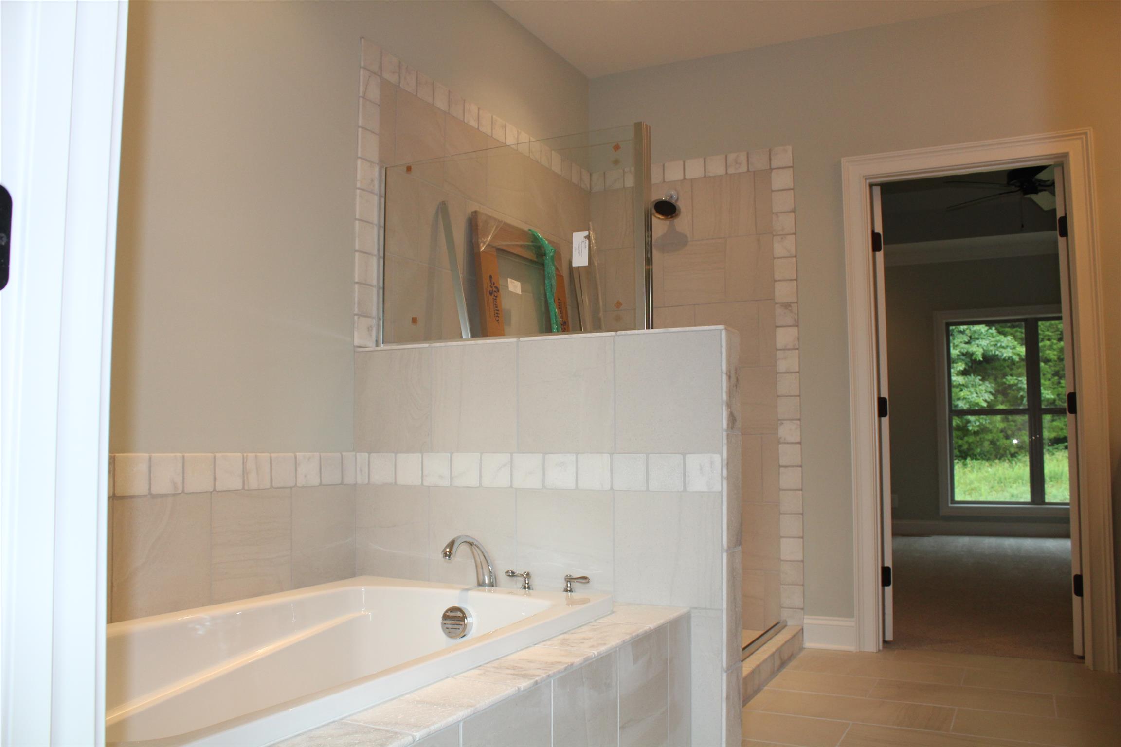 1381 Walnut Hill Road Lebanon, TN 37090 - Photo 18 of 26 a bathroom with a bathtub