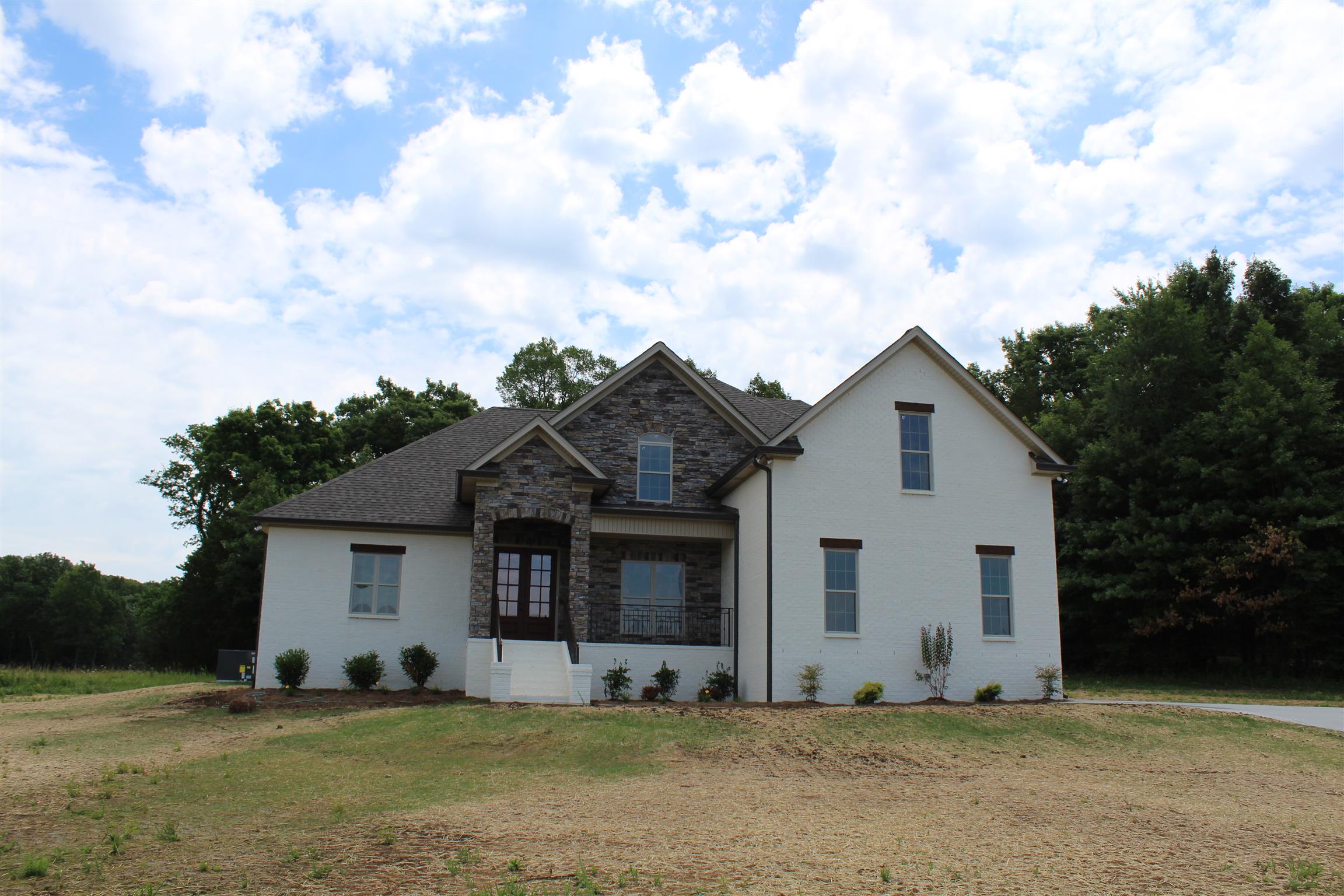 1381 Walnut Hill Road Lebanon, TN 37090 - Photo 2 of 26 a view of a house with a yard