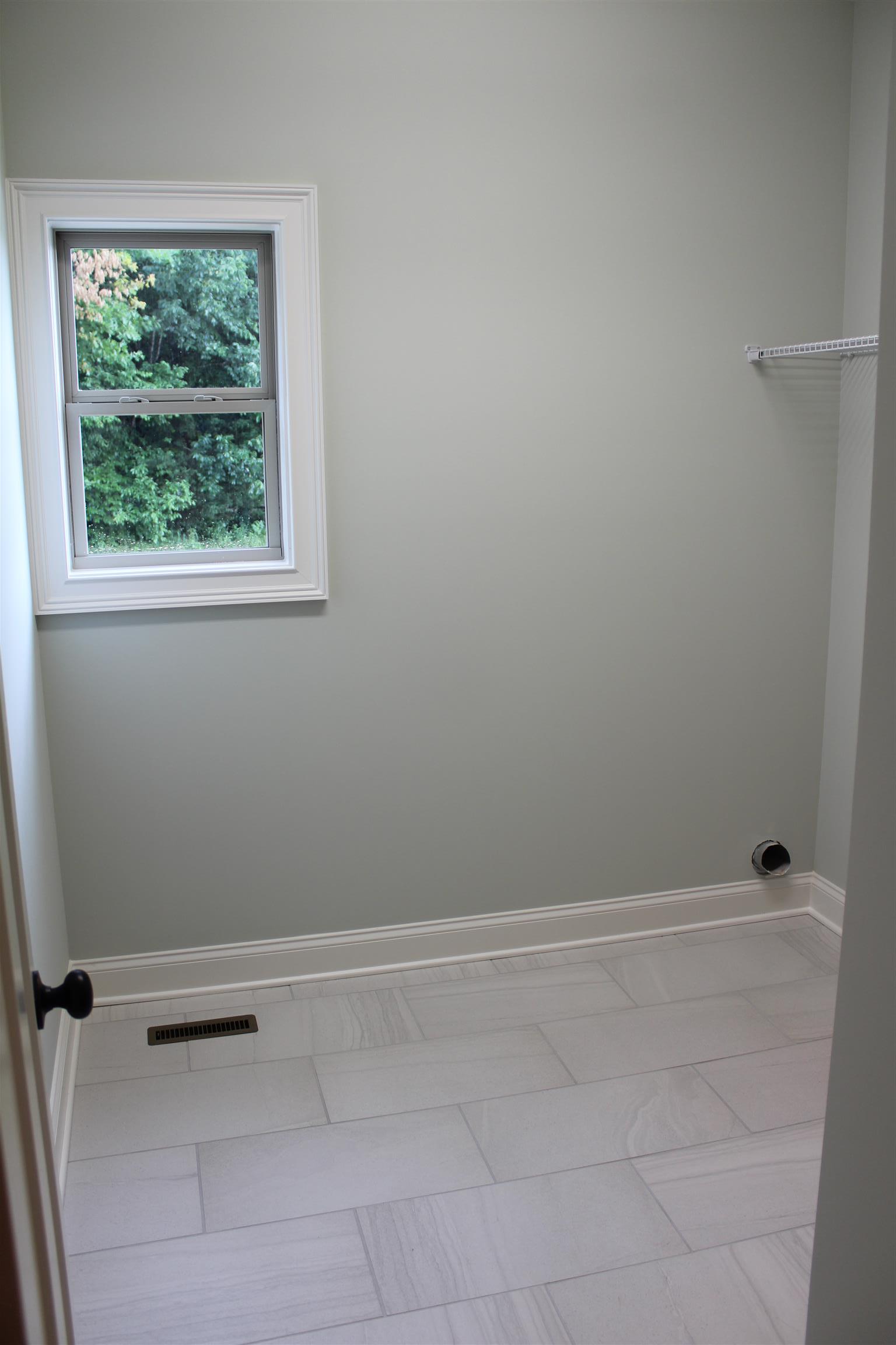 1381 Walnut Hill Road Lebanon, TN 37090 - Photo 21 of 26 a view of a room with rack on the wall and window