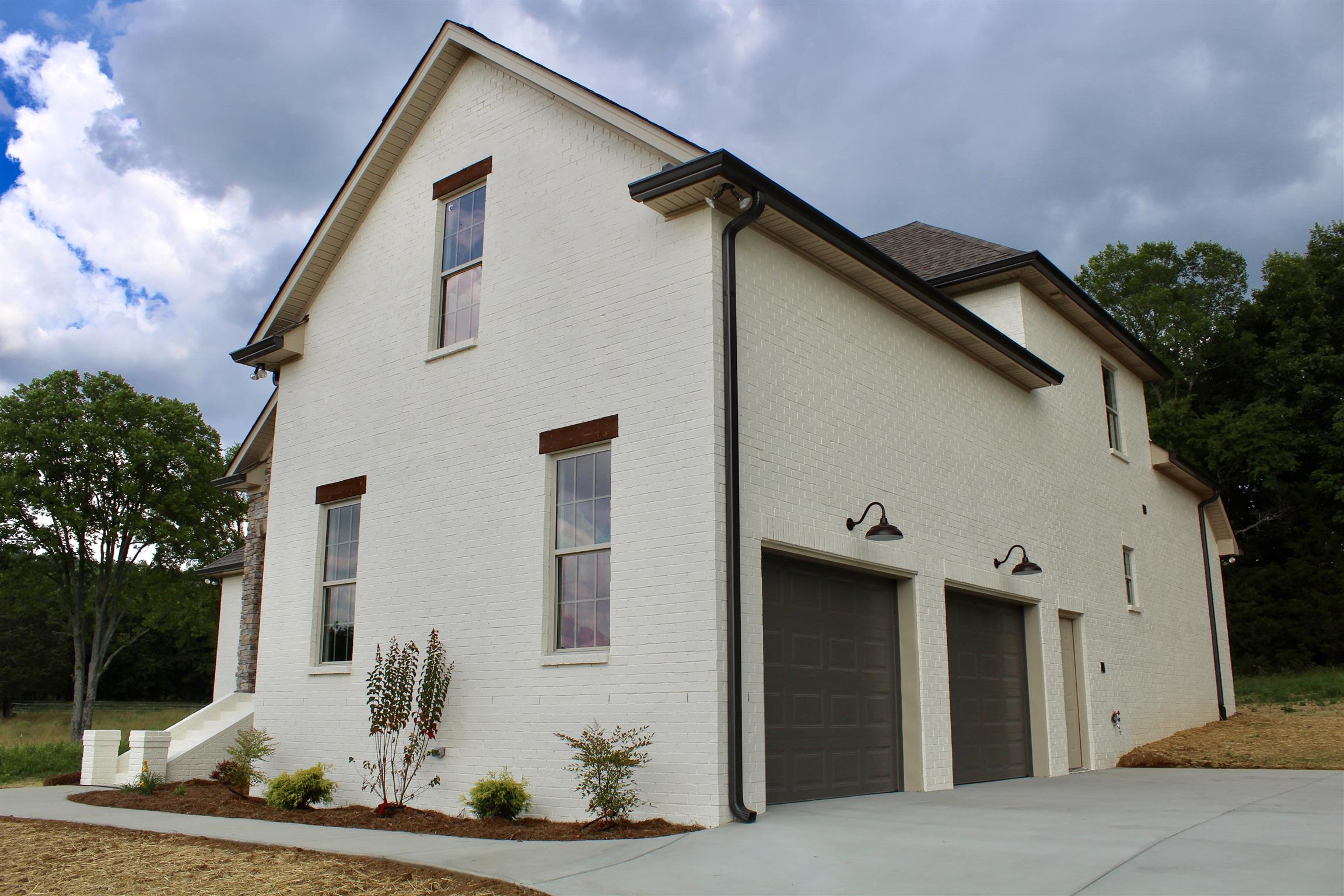 1381 Walnut Hill Road Lebanon, TN 37090 - Photo 5 of 26 a front view of a house with a yard