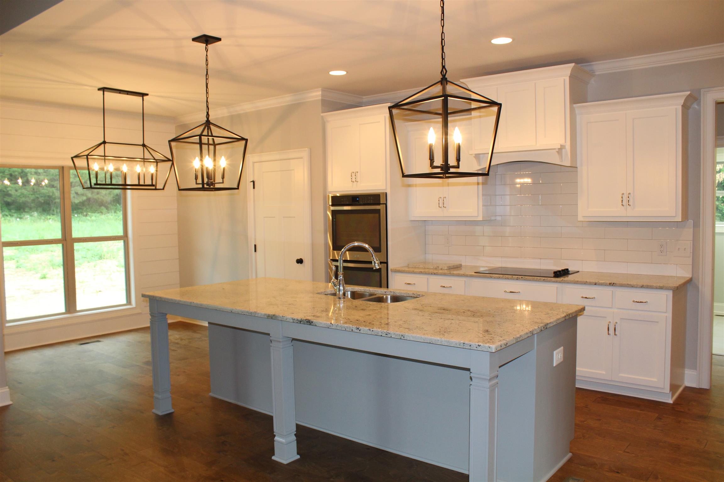 1381 Walnut Hill Road Lebanon, TN 37090 - Photo 6 of 26 a kitchen with a sink a counter space and cabinets