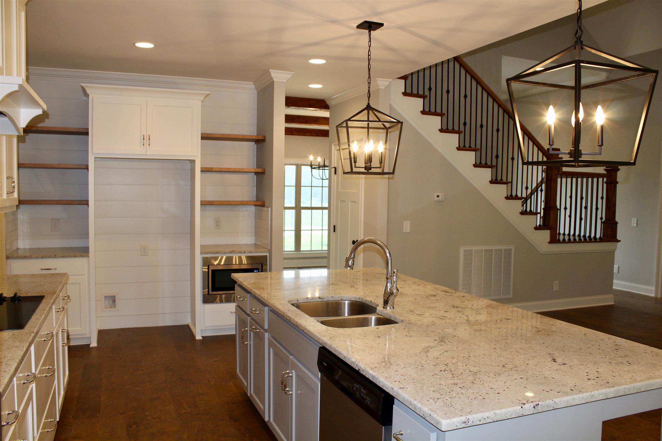 1381 Walnut Hill Road Lebanon, TN 37090 - Photo 7 of 26 a kitchen with stainless steel appliances granite countertop a sink a stove and a refrigerator