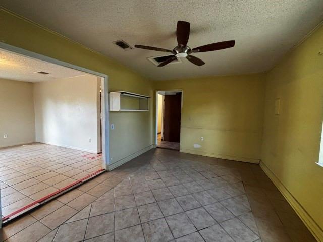 122 Rosa Street Edna, TX 77957 - Photo 9 of 17 a view of a livingroom with a ceiling fan and window