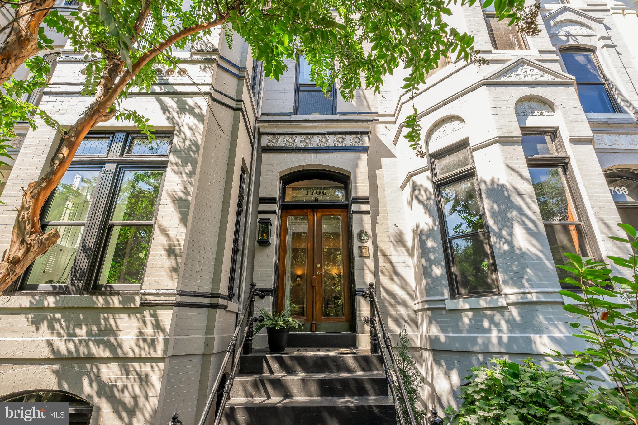 a view of a building with a tree