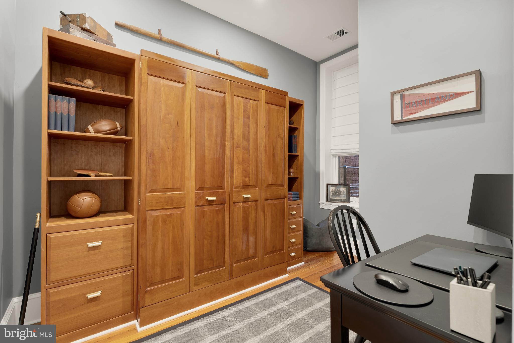 1704 19th Street Northwest, Unit 5 Washington, DC 20009 - Photo 12 of 25 a bathroom with a sink and a mirror