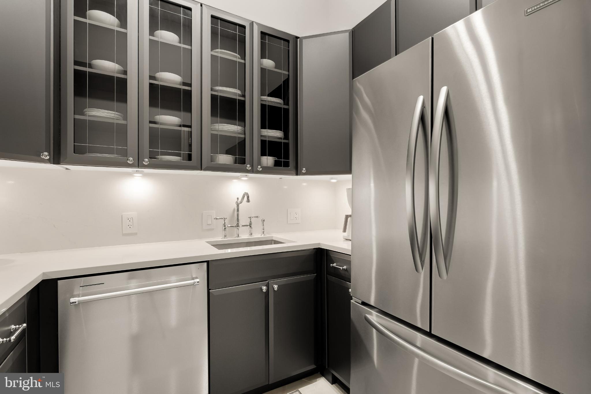 1704 19th Street Northwest, Unit 5 Washington, DC 20009 - Photo 15 of 25 a close view of refrigerator and sink