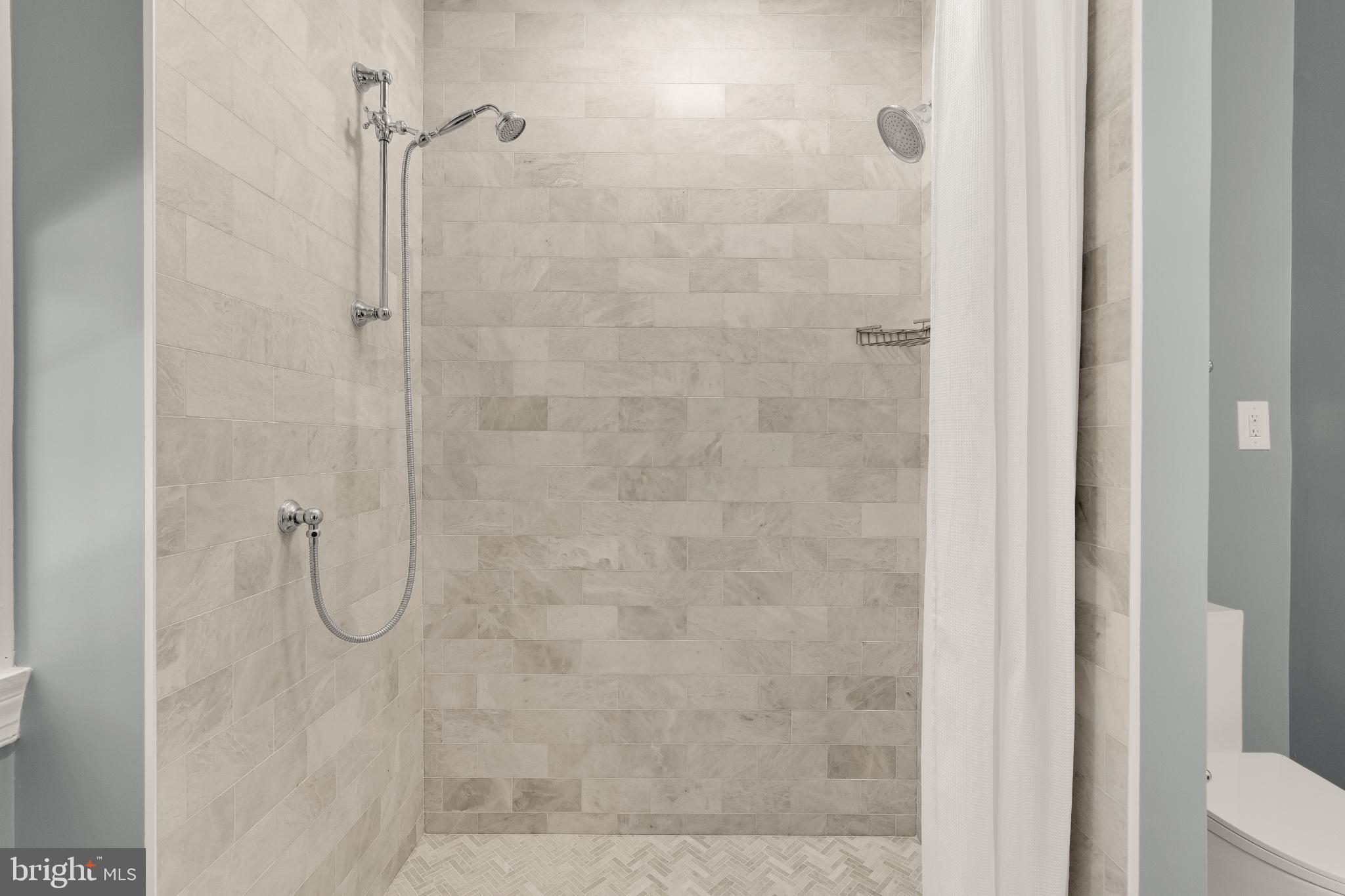 1704 19th Street Northwest, Unit 5 Washington, DC 20009 - Photo 23 of 25 a bathroom with a shower